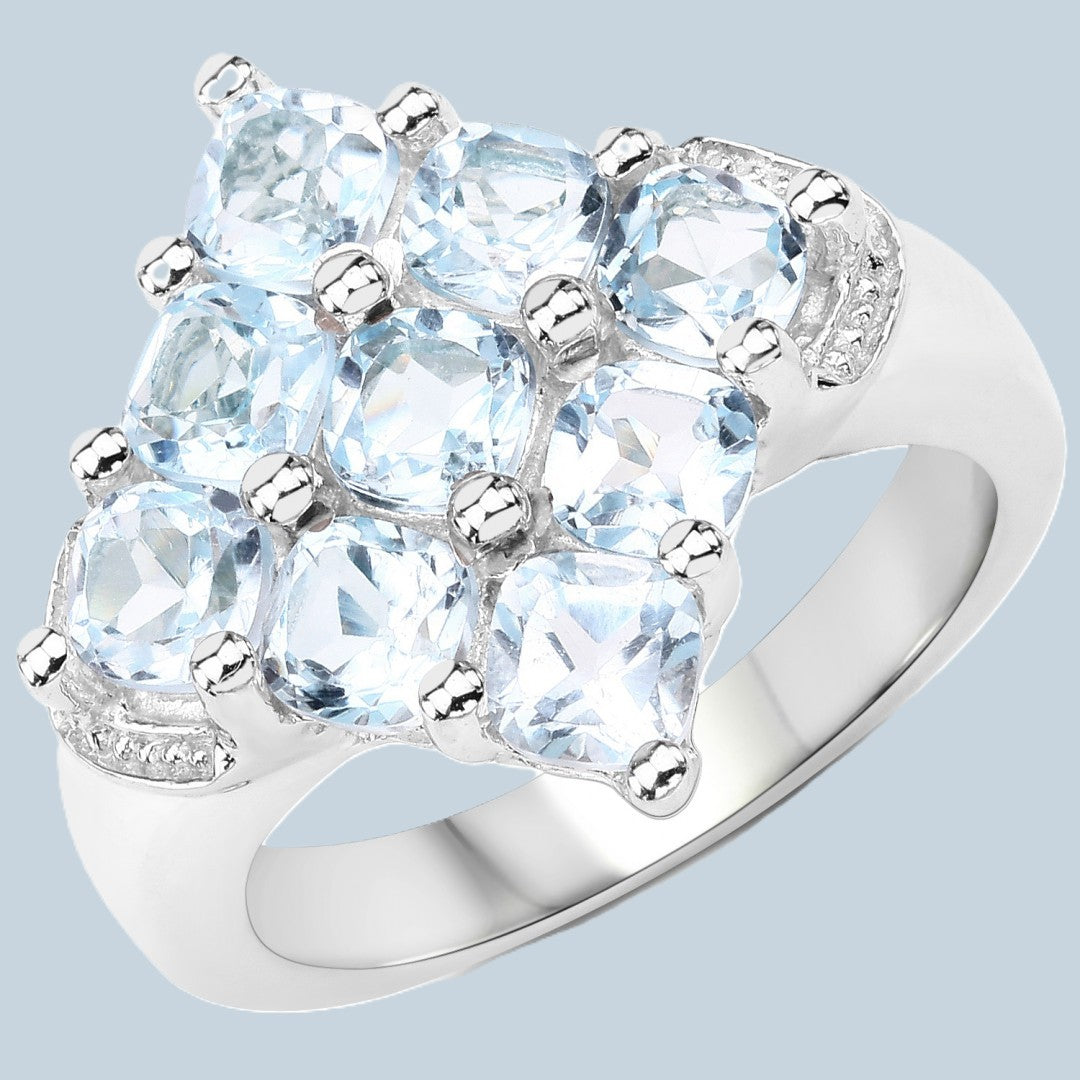 62. A 3.24 CWT Topaz Size 7 Ring in Rhodium Plated Sterling Silver