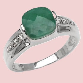 95. 2.4 Carat Emerald highlighted by Topaz set in White Gold Rhodium plated Sterling Silver
